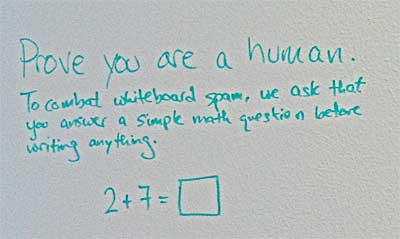 A math question on a whiteboard